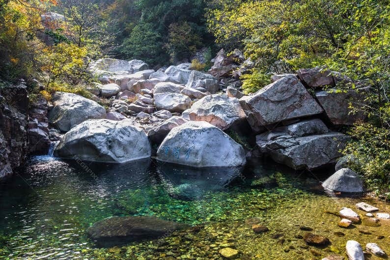 Bei Jiu Shui trail in Autumn, Laoshan Mountain, Qingdao, China. Bei Jiu Shui is famous for the many pools of crystal clear water and it`s waterfalls