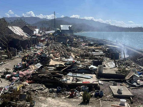 Super Typhoon Uwan (Fung-wong) destruction in Catanduanes, Philippines — homes in Barangay Mayngaway severely damaged after the November 2025 storm, documented by the Philippine Red Cross.