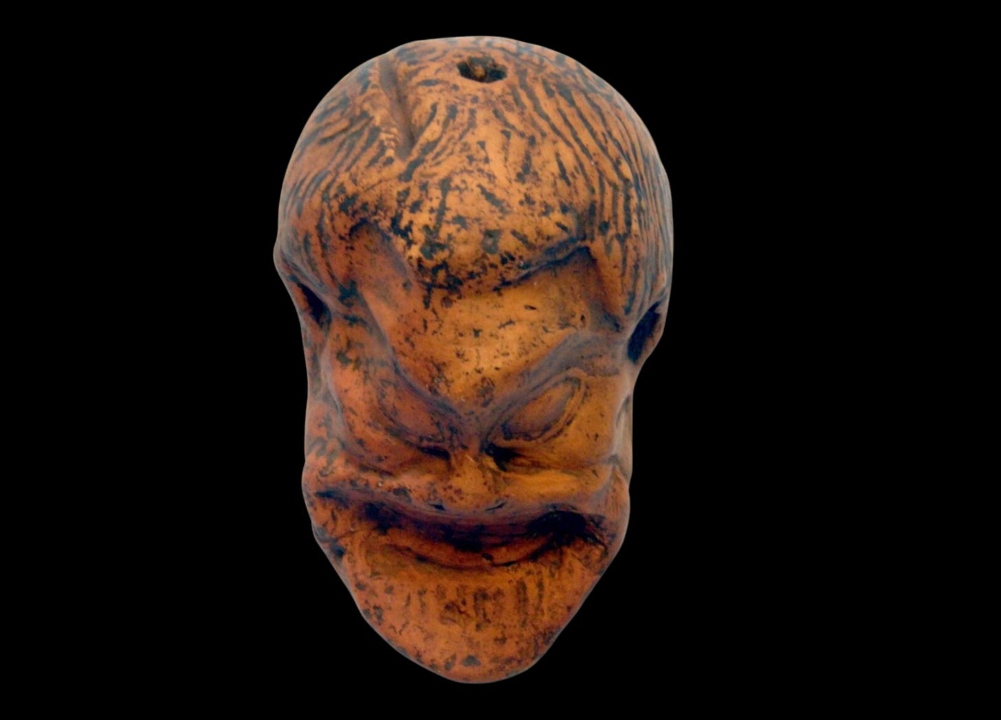 Terracotta head of a Greek theatrical mask from the 4th–3rd century BC