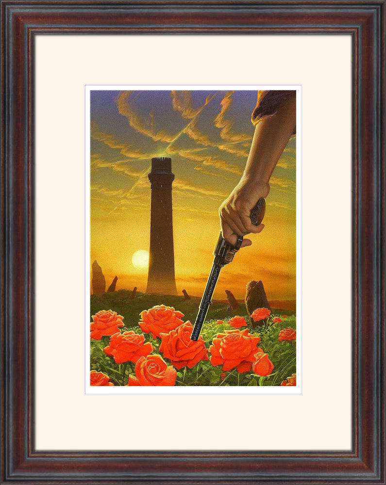 Framed print with off-white / yellow mat and dark walnut veneer moulding. A ground level view of the Dark Tower across a field of roses. The sun hovers low just behind the tower bathing the sky in gold. Clouds flow in parallel wave-like patterns distorted only by the line of four beams cutting across the sky from the top of the tower. In the immediate foreground, we see a big sandalwood revolver gripped in someone's—presumably Roland's—left hand. Intricate, unreadable scrollwork decorates the underside of the barrel. Only his hand and forearm can be see in panel.