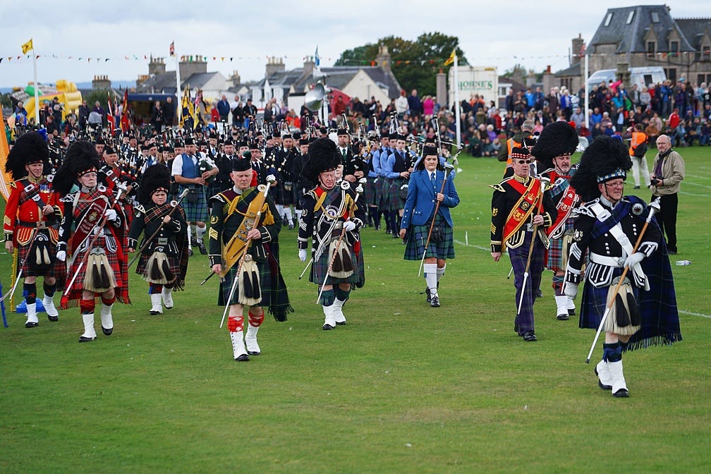 Massed bands at start of Nairn Highland Games 2017
