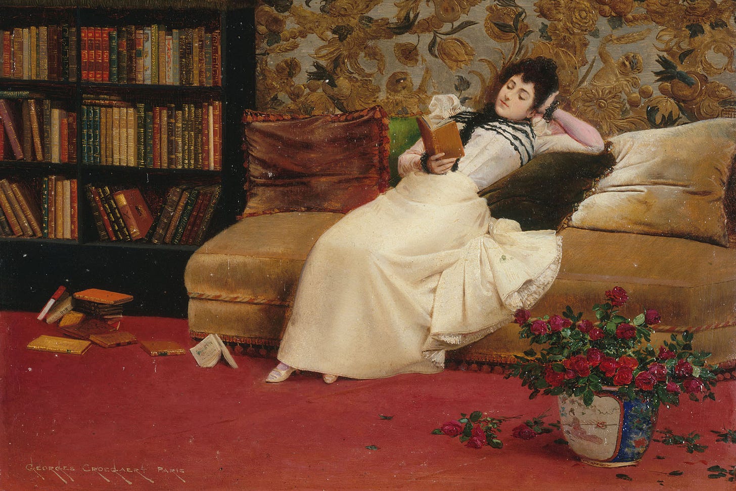 an old painting of a woman lounging on a couch while reading with a bookcase next to her and books strewn about. an old painting of a woman lounging on a couch while reading with a bookcase next to her and books strewn about.