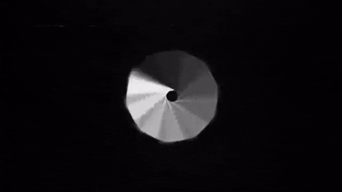 GIF of grainy, expanding white circles against a black background, appearing vaguely as a camera lens GIF of grainy, expanding white circles against a black background, appearing vaguely as a camera lens
