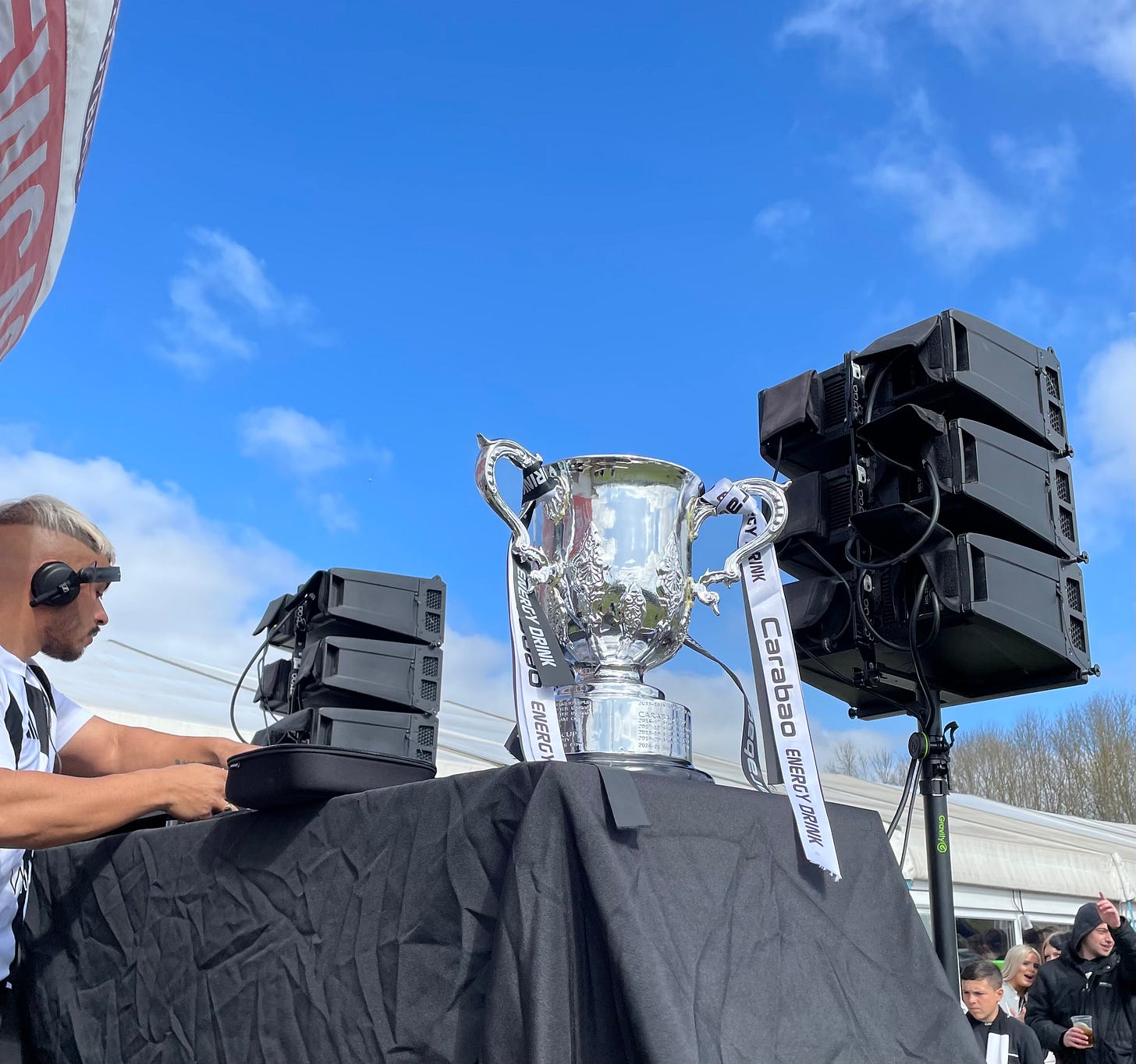 The Carabao cup on the DJ's mixing desk, in the sunshine outside the bar at Newcastle Blue Star