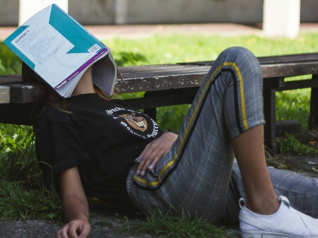 man sitting on surface