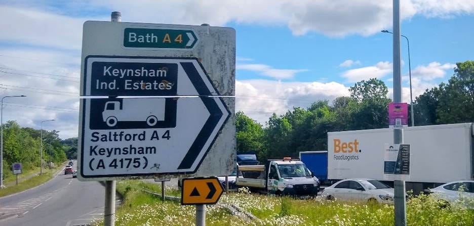 A road with signs and cars on the side
AI-generated content may be incorrect. A road with signs and cars on the side
AI-generated content may be incorrect.