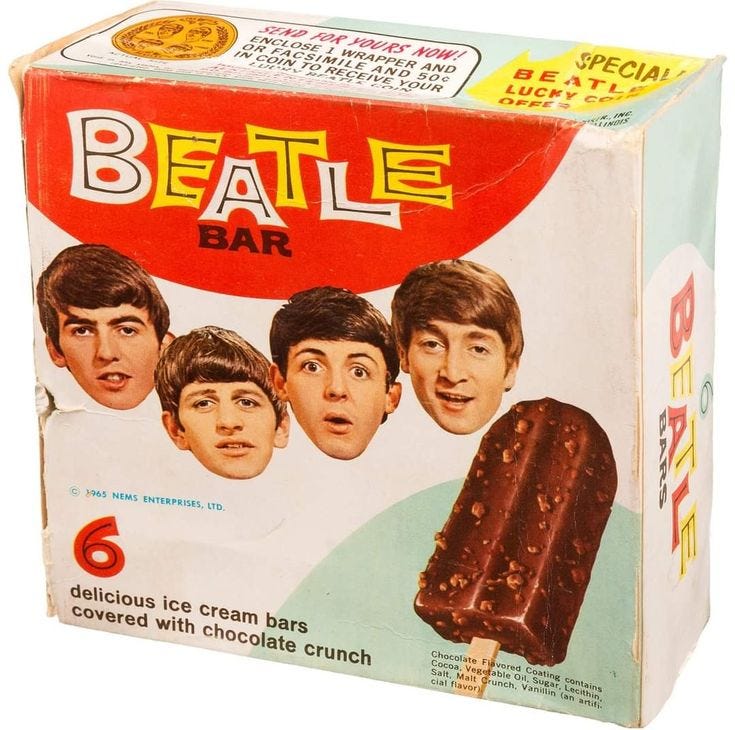 This may contain: an old box of chocolate ice cream with the beatles on it's front and sides This may contain: an old box of chocolate ice cream with the beatles on it's front and sides