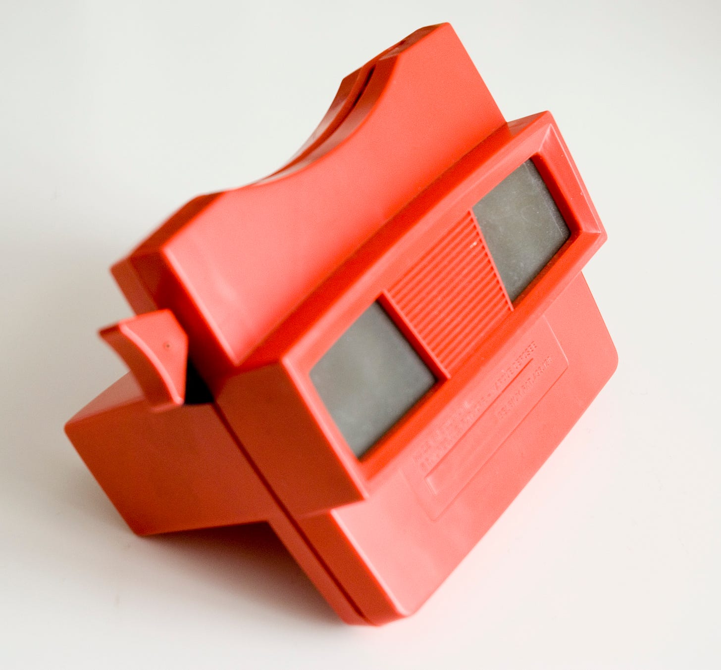 A red View-Master toy A red View-Master toy