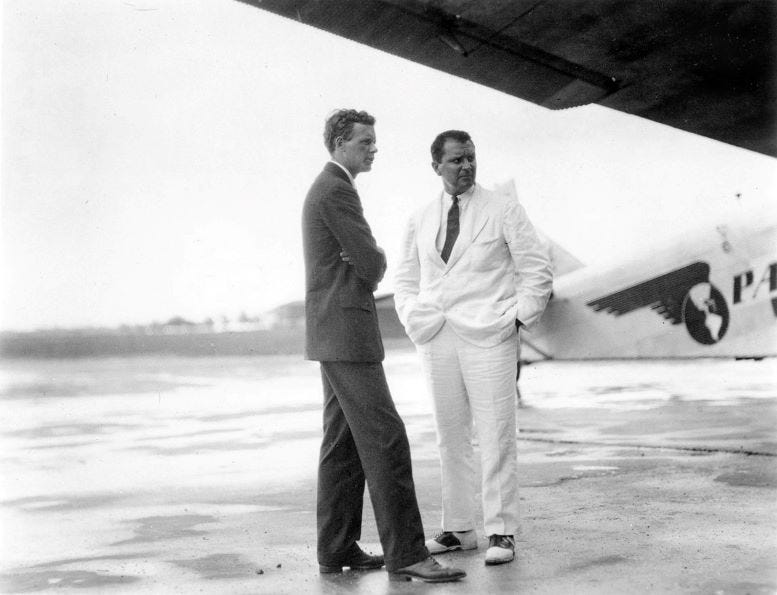 Charles Lindbergh (left), with Juan Trippe (right), in 1928. Courtesy of Yale Alumni website.