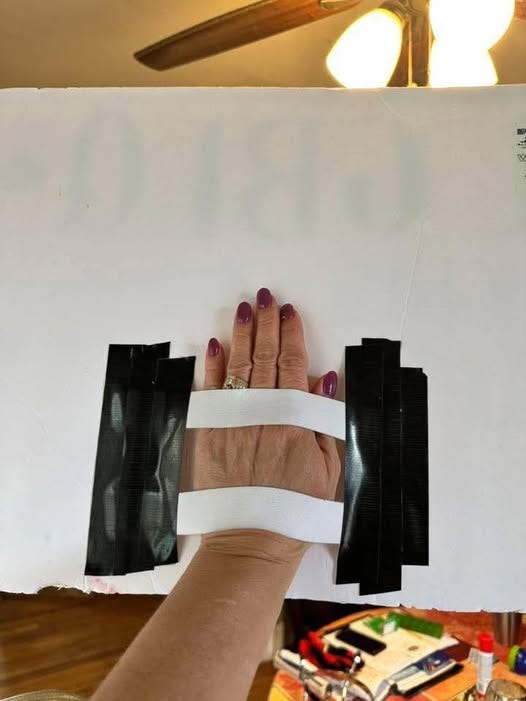 Gorilla tape & elastic on the back of the sign makes it super easy to wave & your hands don’t cramp holding it. I’ve had dozens of ppl come up to me saying it’s genious. Easy to dance with too!