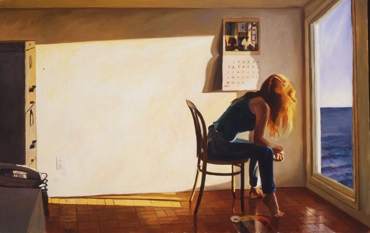 A person sitting on a chair

Description automatically generated with medium confidence