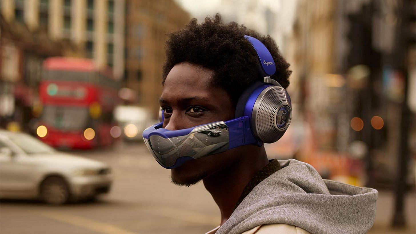 Man wearing headphones with visor attached Man wearing headphones with visor attached