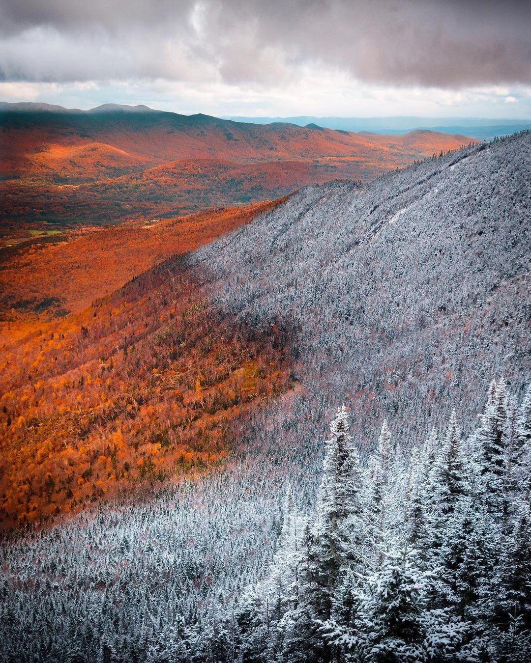 Mountain landscape with half frozen half not