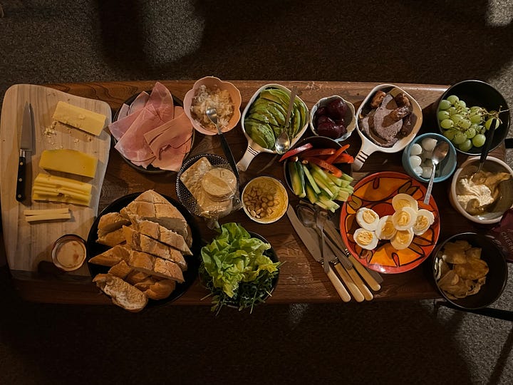 a table of tasty food and a traditional trfle