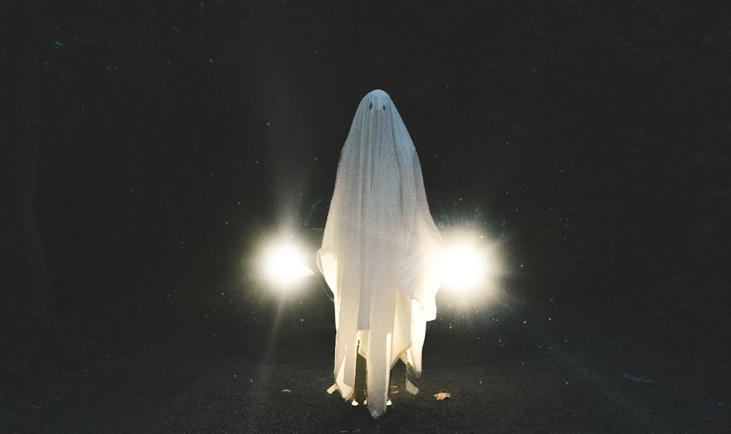 a person standing in the dark