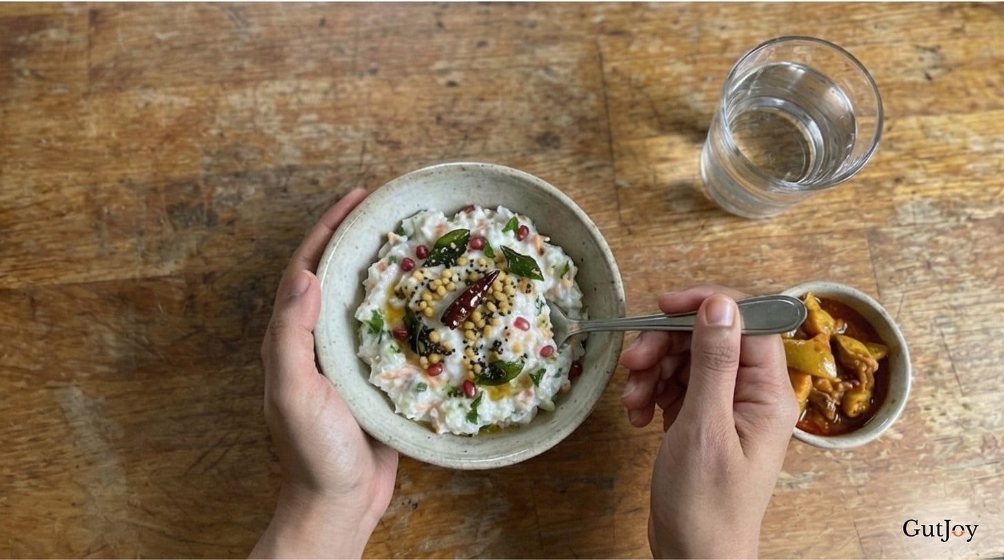 Dairy-free curd rice with cucumber, carrot, pomegranate, and curry leaves.