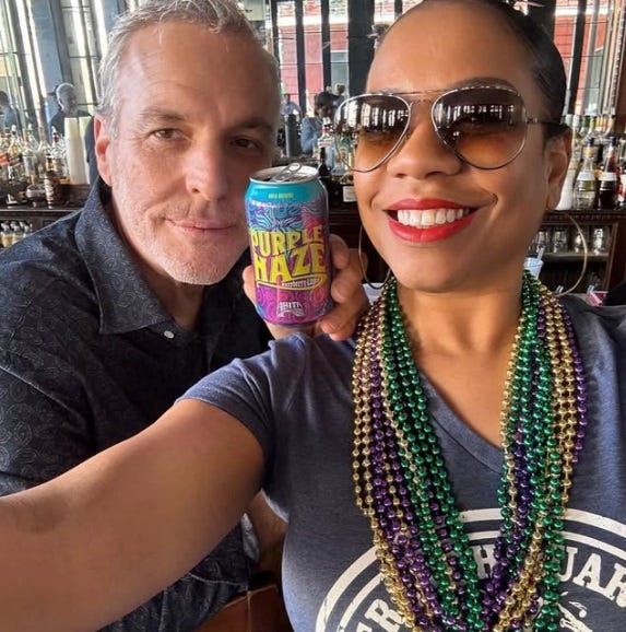Millionaire Real Estate Developer Kevin Barry Love and Kamillah Hanks partying in New Orleans.