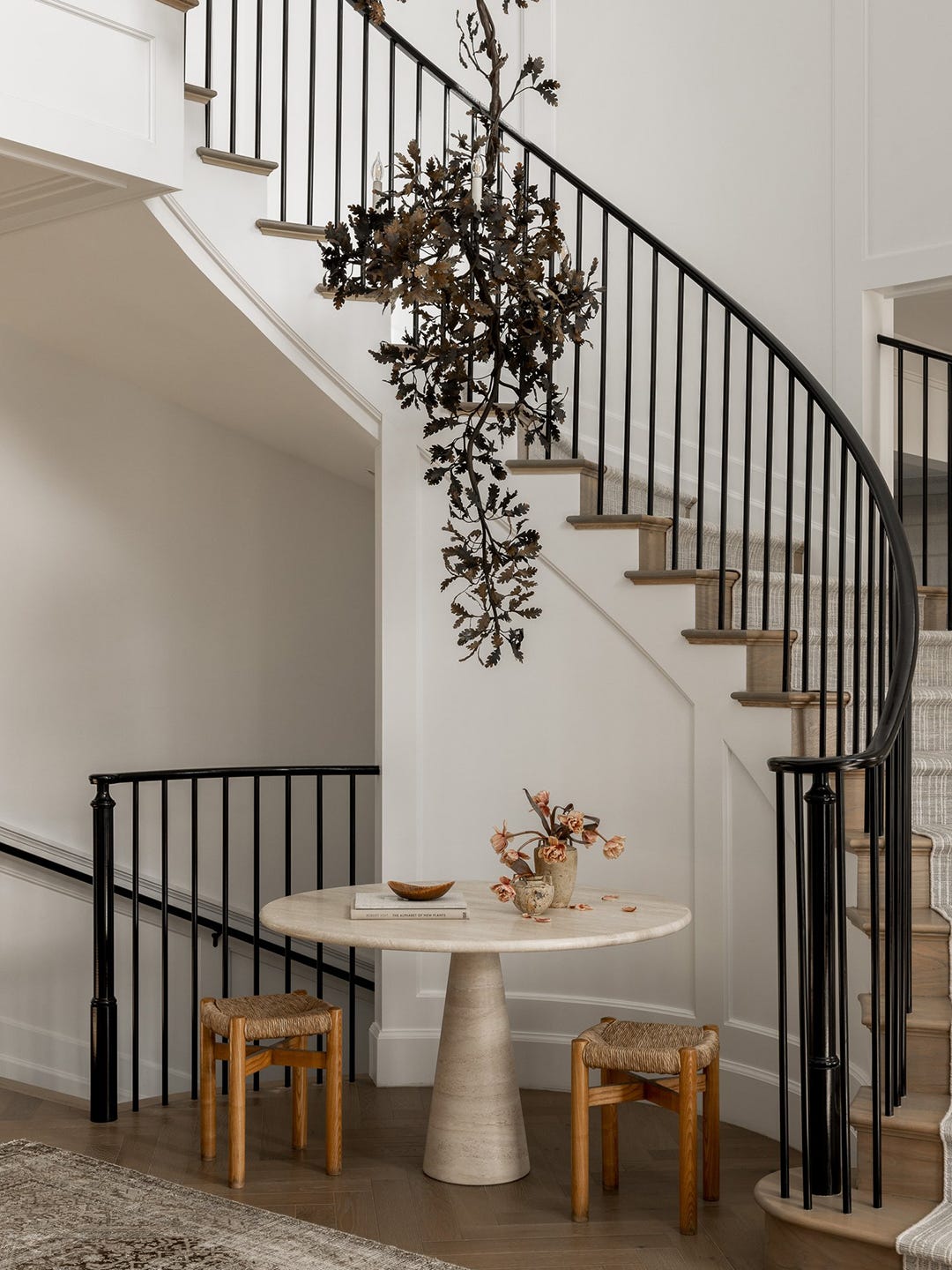 Staircase with tree chandelier Staircase with tree chandelier