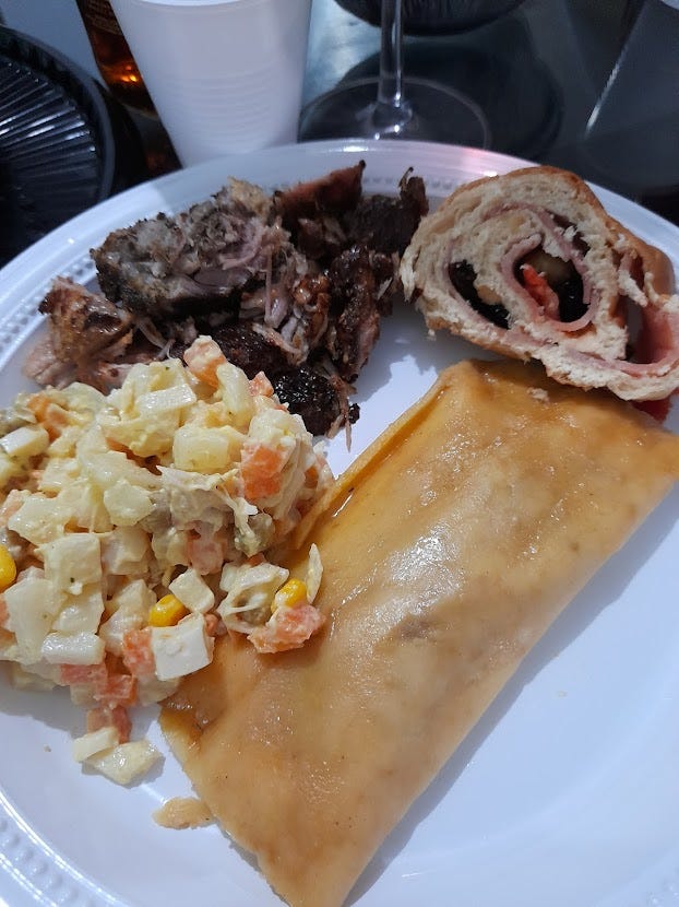 Venezuelan Christmas plate, with roast beef, pan de jamón, a potato salad, and hallaca (all described in the text below) Venezuelan Christmas plate, with roast beef, pan de jamón, a potato salad, and hallaca (all described in the text below)