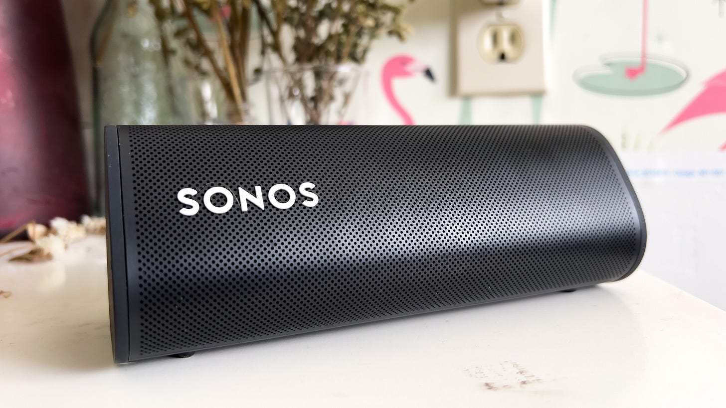 Sonos Roam sitting on a white table Sonos Roam sitting on a white table