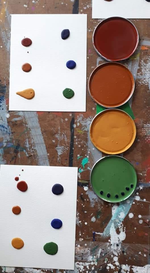 Logo and images of hand mulled watercolor paints