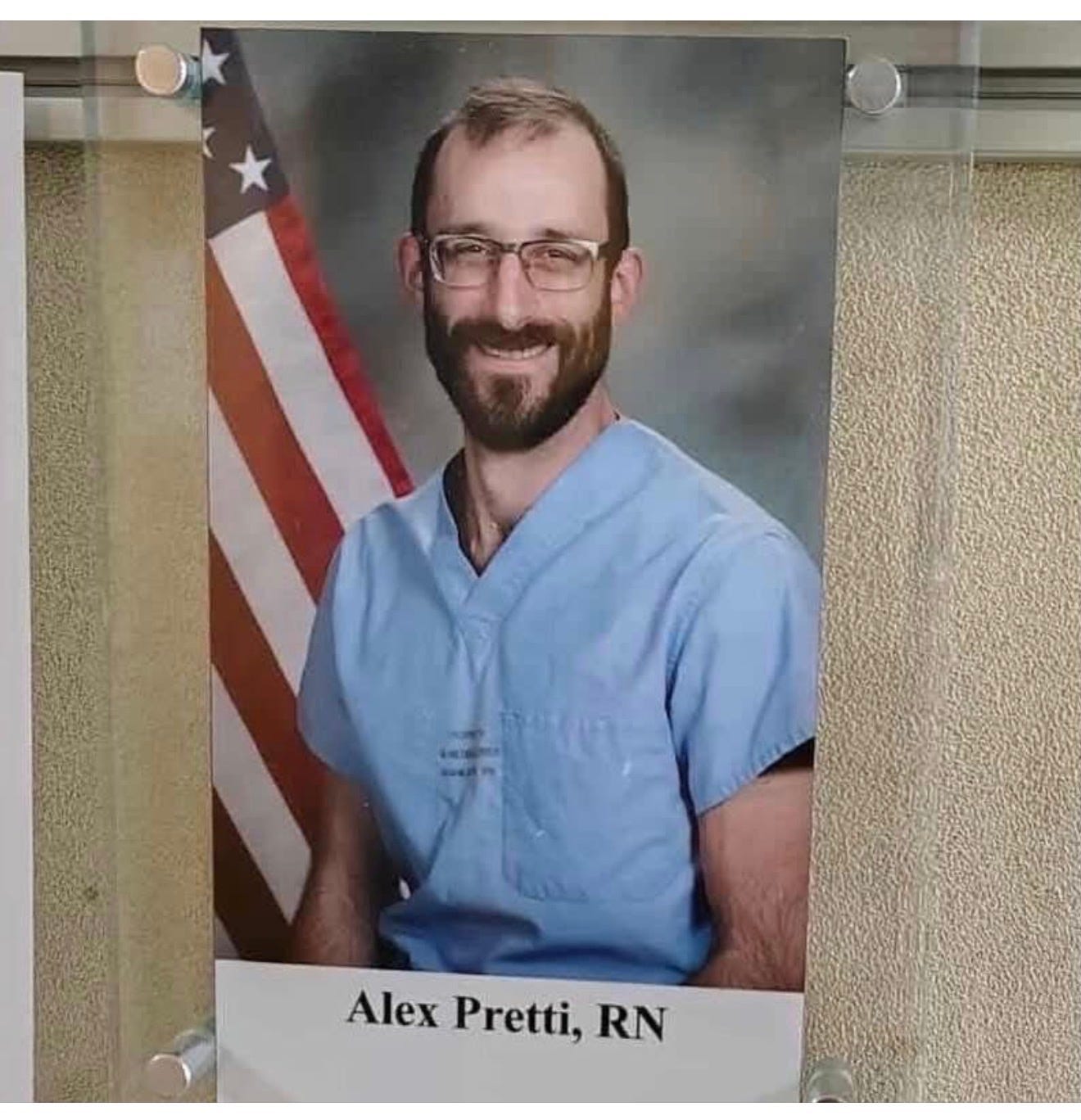 A portrait of a person in a blue shirt

AI-generated content may be incorrect.