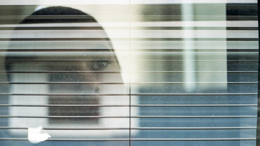 Film multiple exposure boy and window blinds Film multiple exposure boy and window blinds
