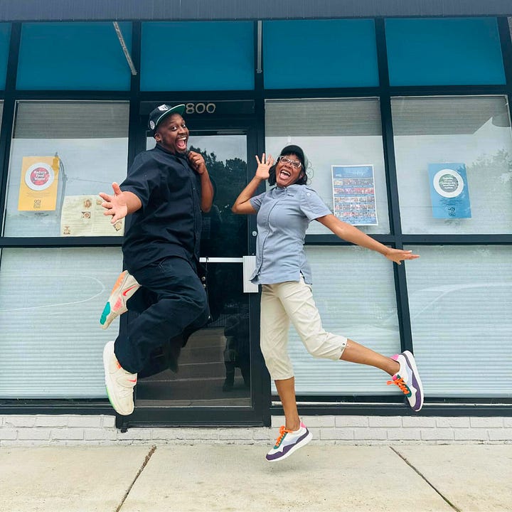 Two chefs, Marisa and Kevin, sharing playful energy—one photo shows them smiling and pointing at the camera in chef coats, and the other shows them mid-jump outside a restaurant, laughing together.