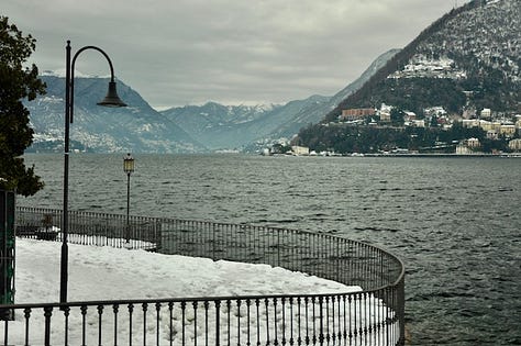 Top L-R: December 2009 snow-covered Lake Como, boarding for the seaplane tour, palm trees and persimmon in the snow, grey winter lake, a chilly seagully, view up the lake toward the Italian Alps
