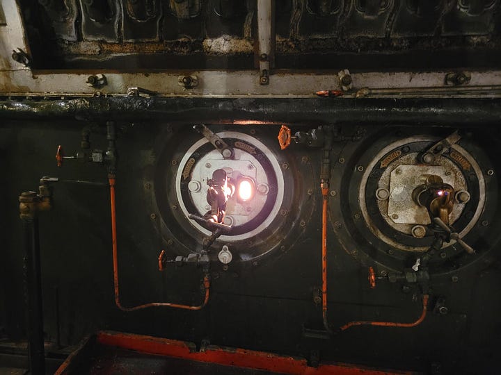 The fireboxes, one of the window ports, the boiler tube ends and a diagram of the engine itself