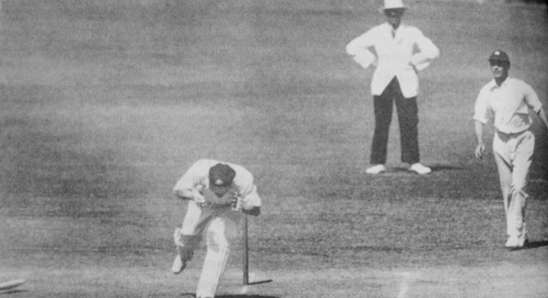 A black and white picture of Bert Oldfield being struck playing Test cricket with Harold Larwood A black and white picture of Bert Oldfield being struck playing Test cricket with Harold Larwood