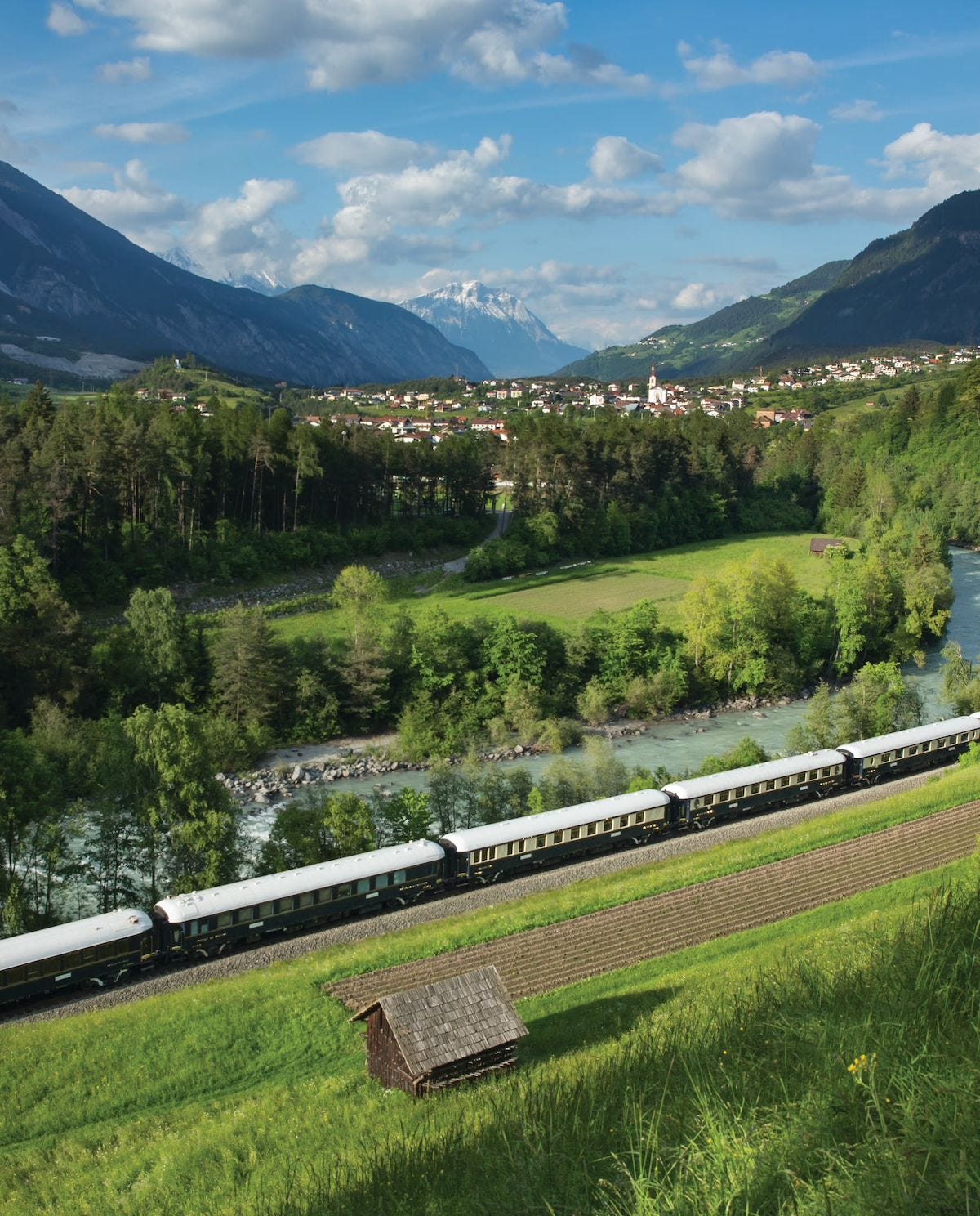 The Venice Simplon-Orient-Express traveling through the European countryside. The Venice Simplon-Orient-Express traveling through the European countryside.