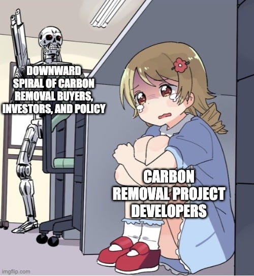 An anime girl labelled "Carbon removal project developers" hugs her knees in fear while a skeleton at a desk behind her, labelled "Downward spiral of carbon removal buyers, investors, and policy," looms over her.