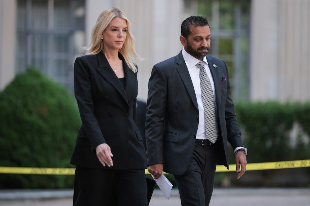 Attorney General Pam Bondi and FBI Director Kash Patel walk side by side.