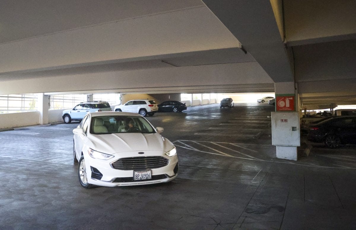 A car approaches a turn in parking Lot H at El Camino College on Monday, Sept. 8. (Erica Lee | The Union)