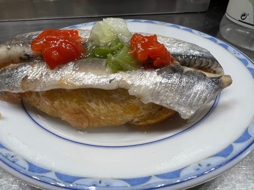 A fish on a plate

Description automatically generated with medium confidence