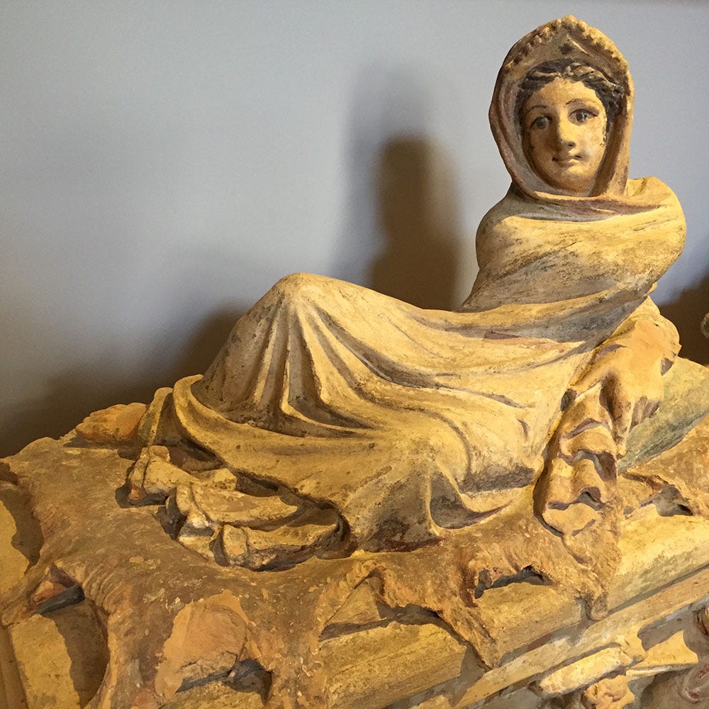 A statue of a person lying on a ledge
AI-generated content may be incorrect. A statue of a person lying on a ledge
AI-generated content may be incorrect.