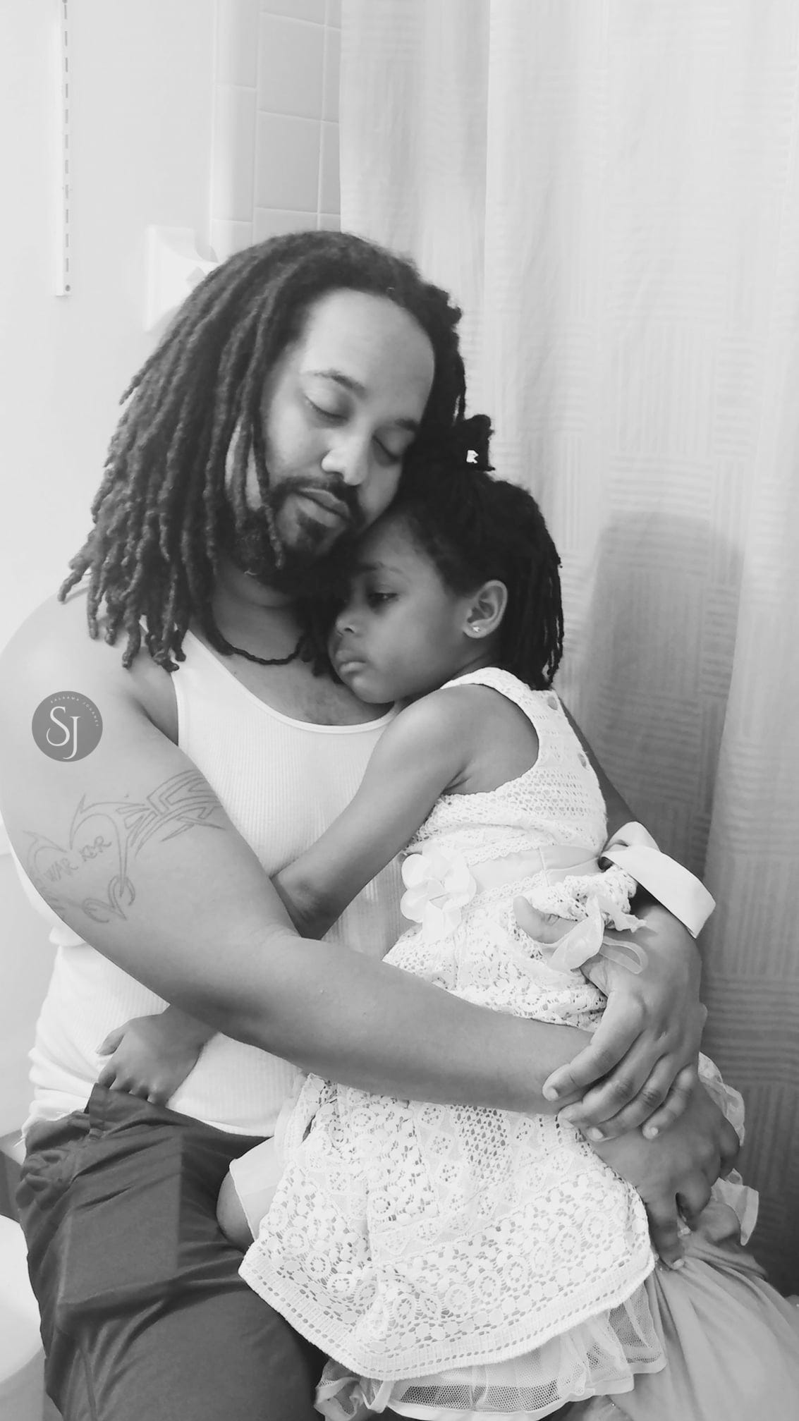 Alt text: A nurturing moment between a parent and child, symbolizing the power of Divine Alchemy in everyday life—where care, mentorship, and emotional validation create real transformation.
