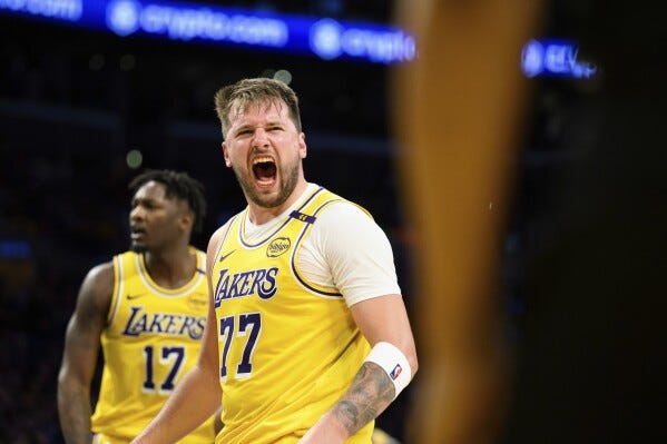 Luka Doncic's new Lakers teammates say he's ready to face the Mavericks 3  weeks after the trade | AP News