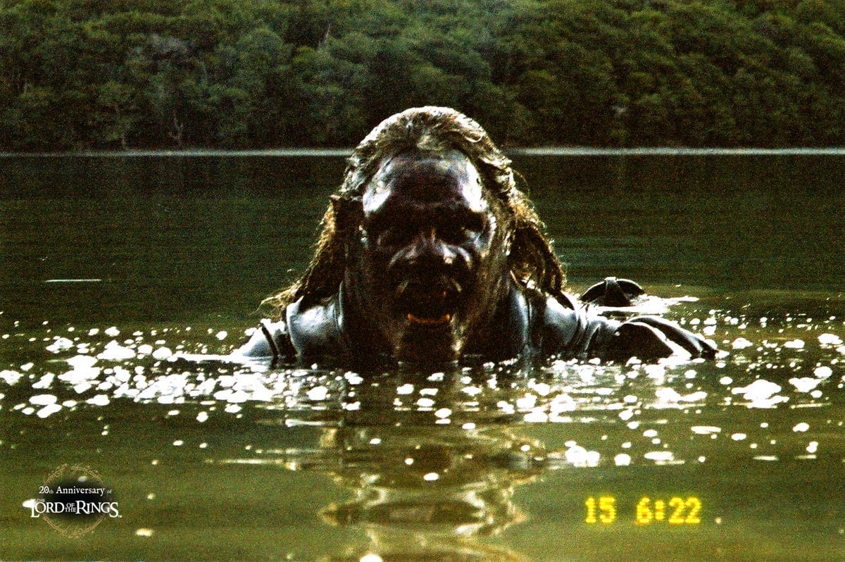 The original ending of Fellowship included an Uruk-hai dragging Frodo out  of the boat. : r/lotr