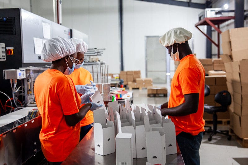 Employees at Fairafric's processing plant. Employees at Fairafric's processing plant.