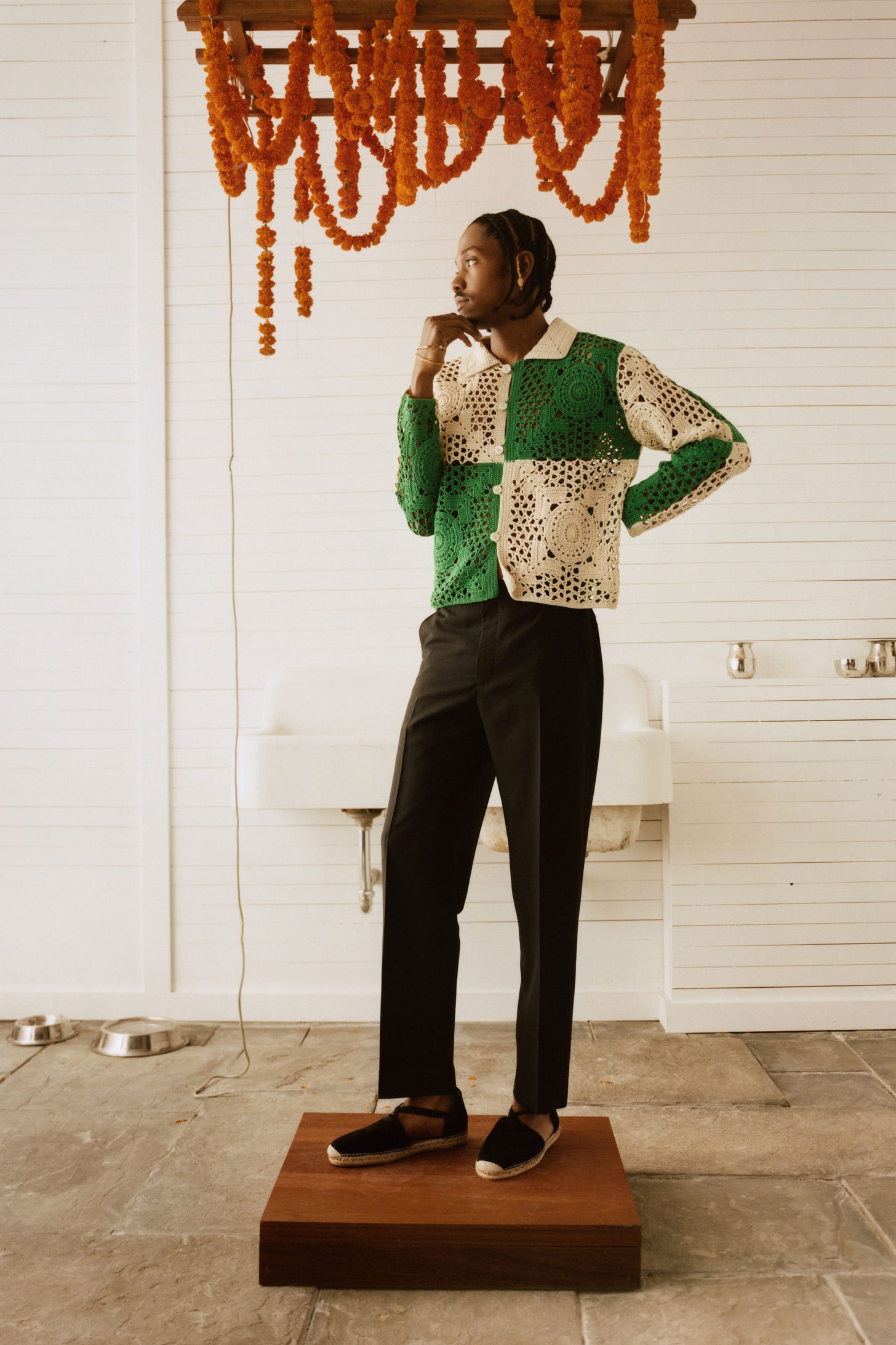 Image may contain Clothing Sleeve Apparel Long Sleeve Human Person Shoe and Footwear