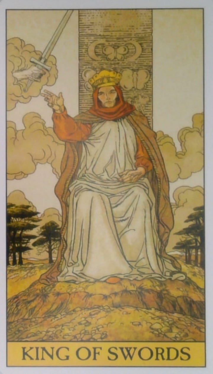 The King of Swords tarot card and the Flow oracle card.