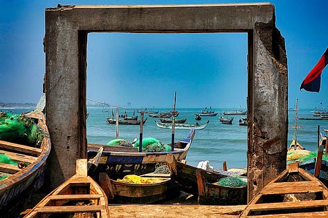 Canoes, boys, girls, pier at James in Accra, Ghana