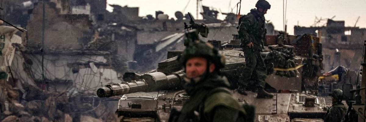Israeli troops and a tank in Gaza 