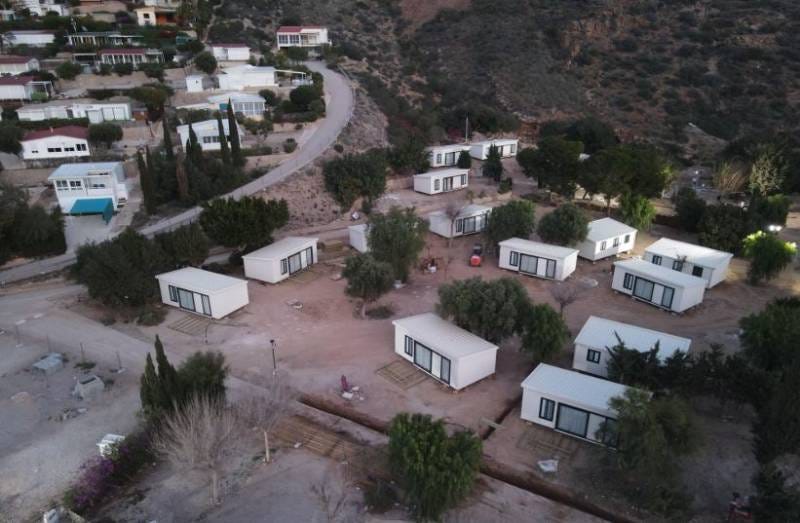 An overhead view of a few small structures around the El Portús campsite.