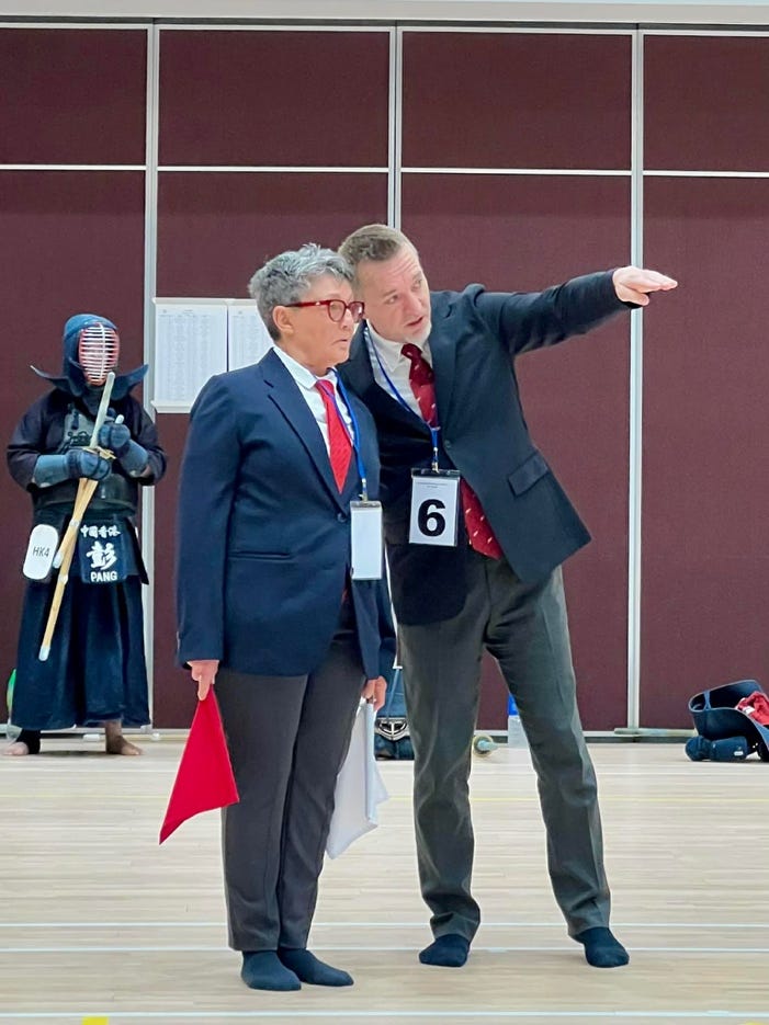 A person pointing at another person
AI-generated content may be incorrect. A person pointing at another person
AI-generated content may be incorrect.