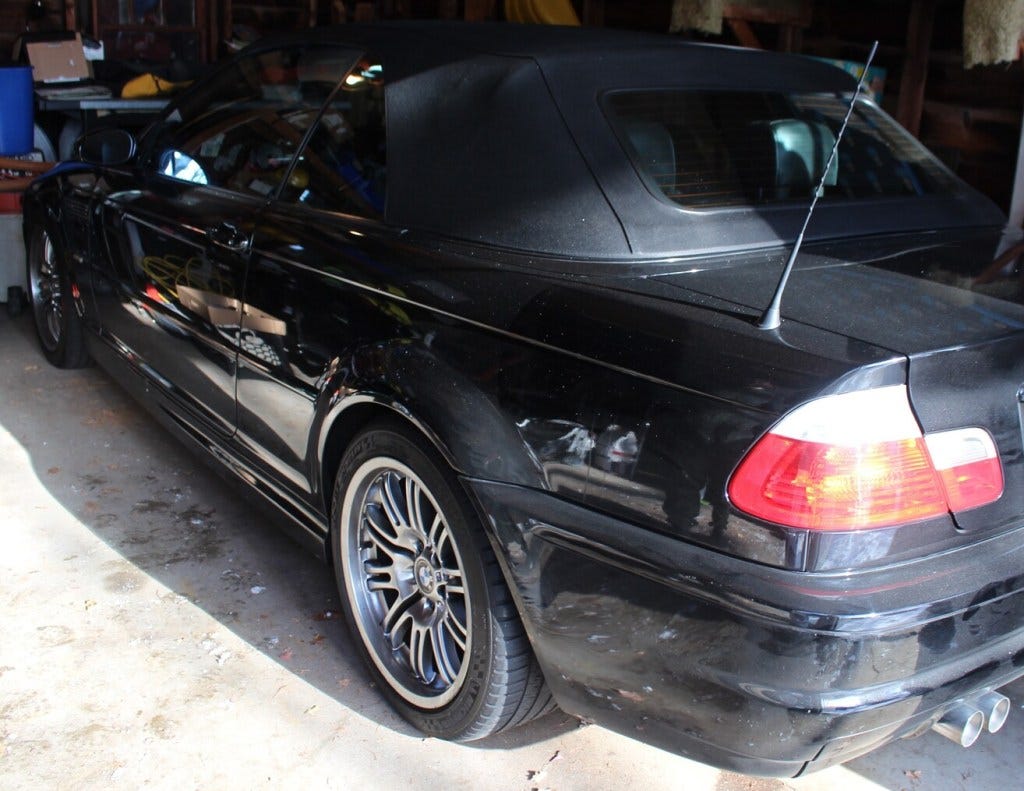 2003 BMW E46 M3 convertible in a garage rear 3/4 2003 BMW E46 M3 convertible in a garage rear 3/4