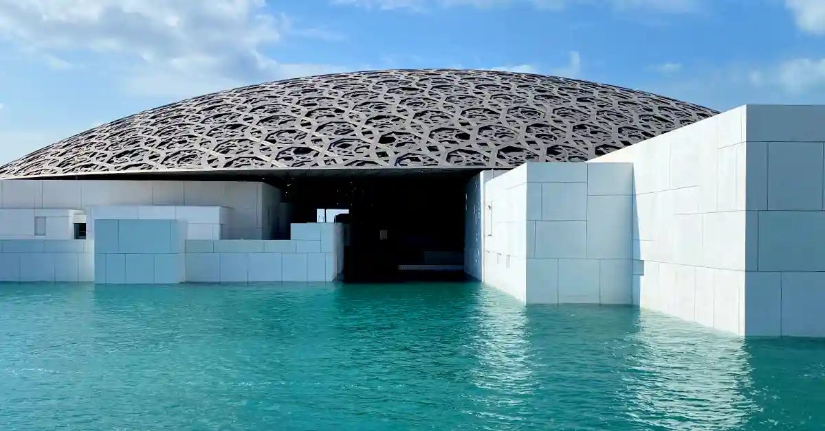 Photo of the exterior of the Louvre in Abu Dhabi.