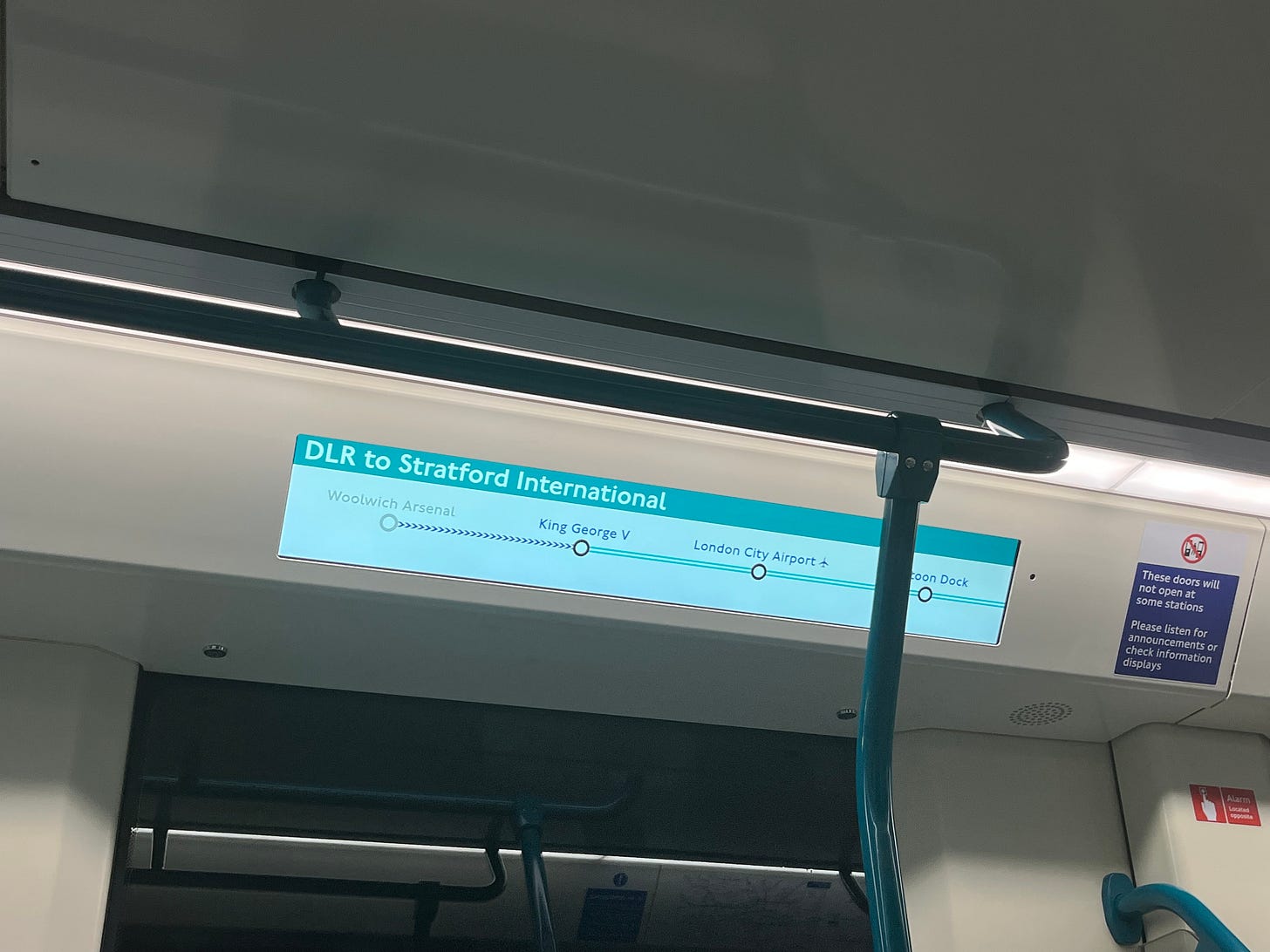 Photo of a passenger information screen showing line diagram.